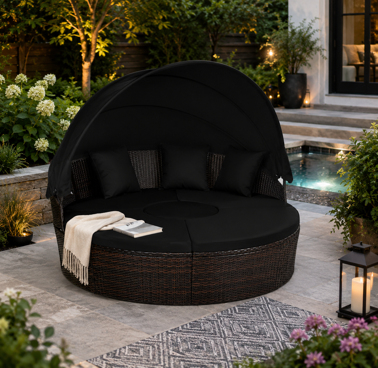 Round outdoor lounge chair with canopy in a garden setting