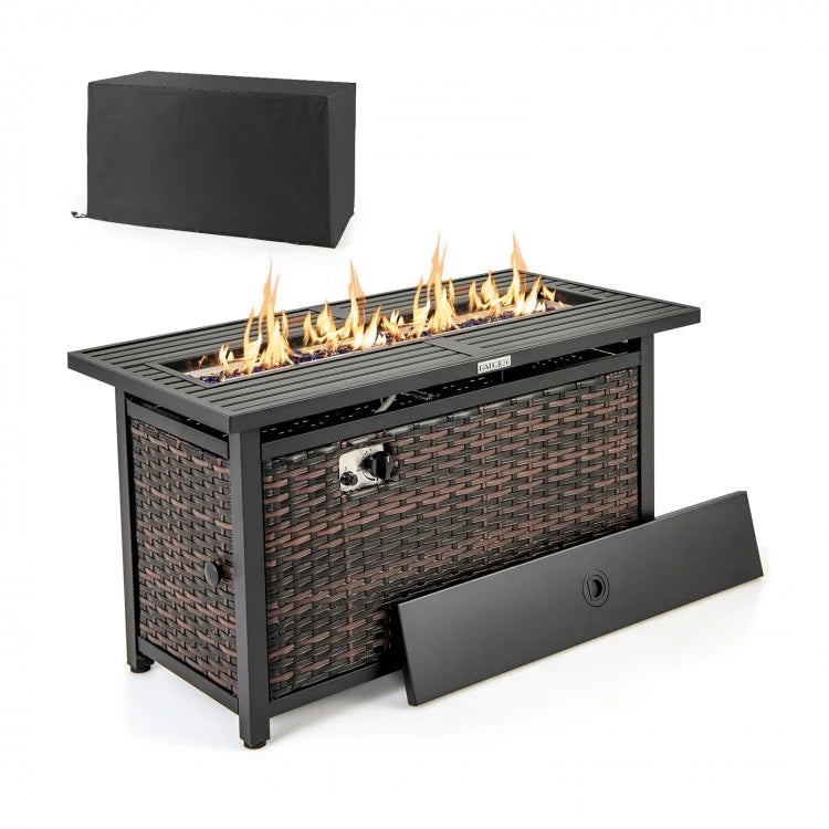 Close-up of adjustable flame on propane fire pit table with glass stones